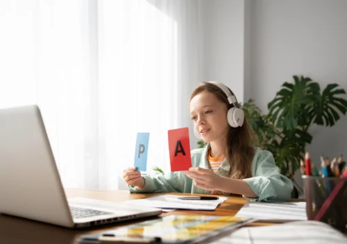 girl-learning-with-laptop-side-view